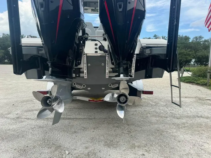  Yacht Photos Pics 2021 ShearWater 270 Carolina Flare boat with dual outboard motors and propellers.