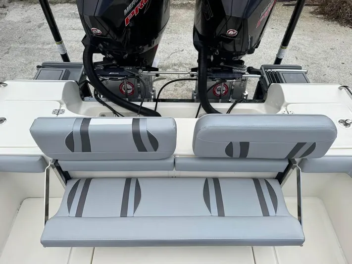  Yacht Photos Pics 2021 ShearWater 270 Carolina Flare boat with dual engines and cushioned seating.