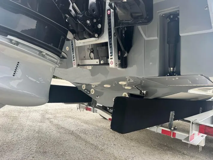  Yacht Photos Pics 2021 ShearWater 270 Carolina Flare boat on trailer, showing hull and engine details.