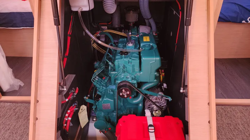 New Stock Boat - Available Now Yacht Photos Pics Engine compartment of 2023 Dufour 470 sailboat, showcasing a modern marine engine.