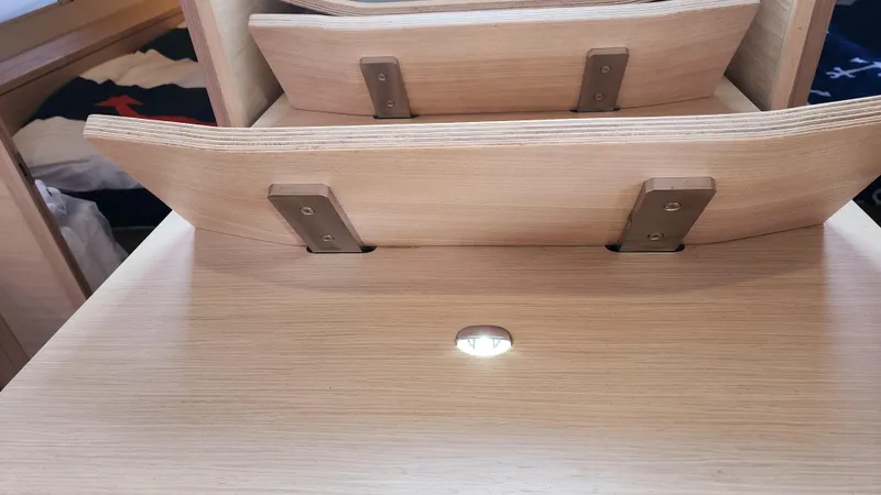 New Stock Boat - Available Now Yacht Photos Pics Interior of 2023 Dufour 470 yacht with wooden cabinetry and modern design.