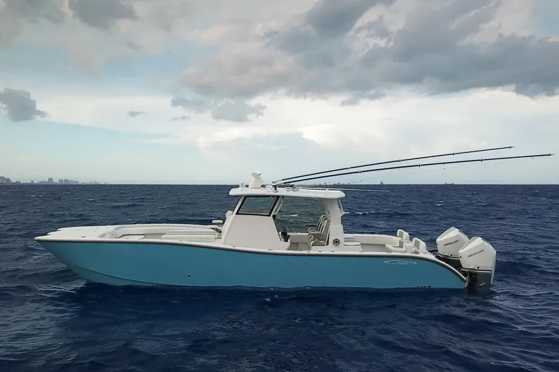  Yacht Photos Pics 2022 Insetta 35IFC boat on open sea under cloudy sky.