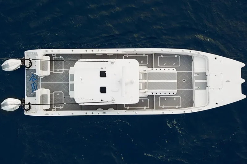  Yacht Photos Pics Aerial view of 2022 Insetta 35IFC boat on water, showcasing deck layout.