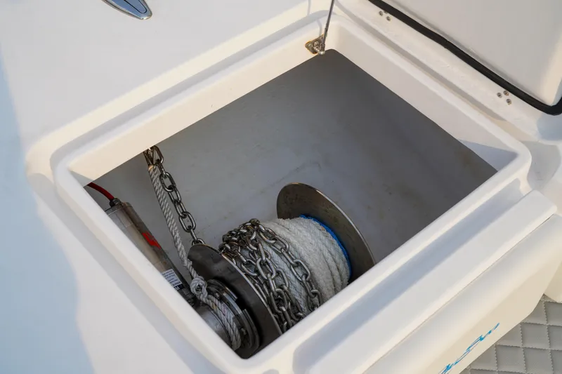  Yacht Photos Pics Anchor storage compartment on 2022 Insetta 35IFC boat, featuring chain and rope.