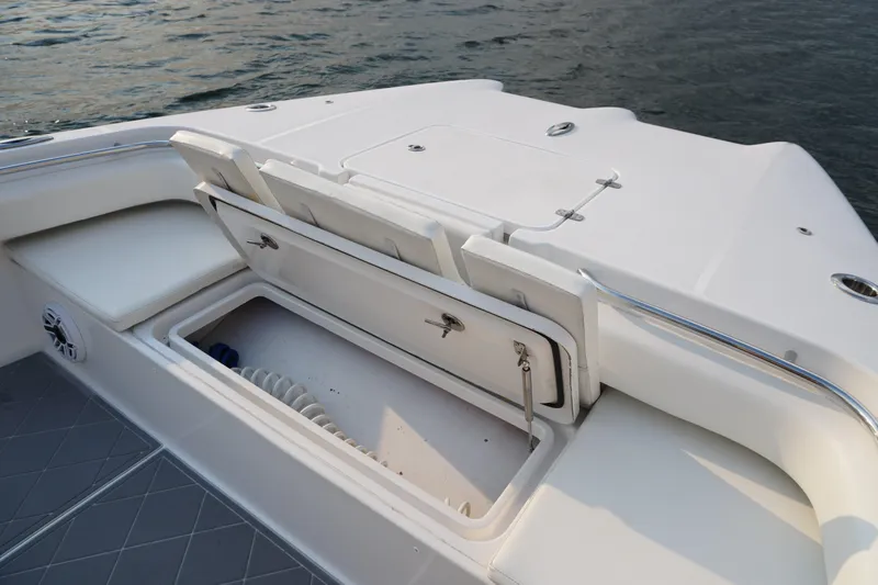  Yacht Photos Pics 2022 Insetta 35IFC boat with open storage compartment on deck.