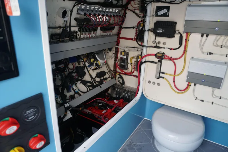  Yacht Photos Pics Electrical system inside 2022 Insetta 35IFC boat, showcasing wiring and components.