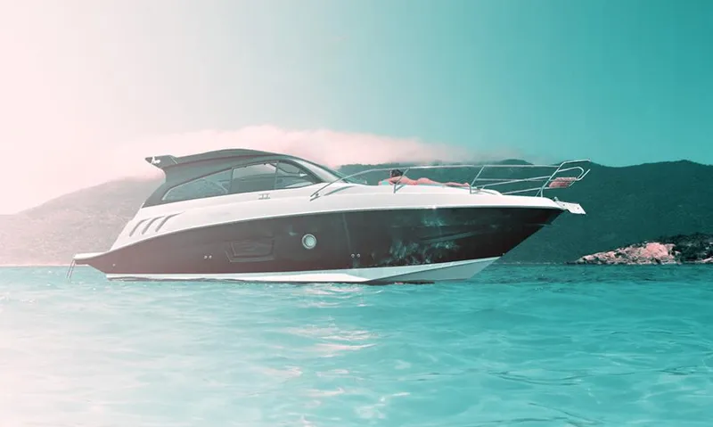 Custom Order Yours Today! Yacht Photos Pics 2025 Hanover 355 Outboard boat on serene water with mountainous backdrop.