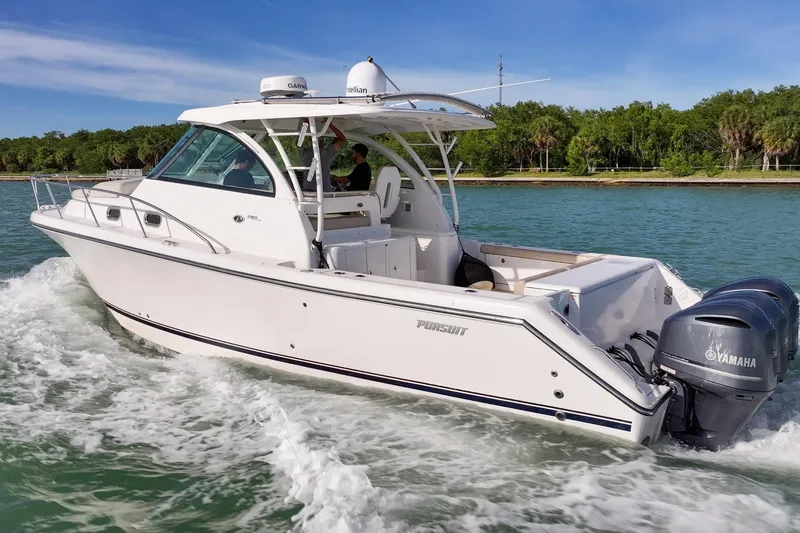  Yacht Photos Pics 2016 Pursuit OS 385 Offshore boat cruising on a sunny day with Yamaha engines.