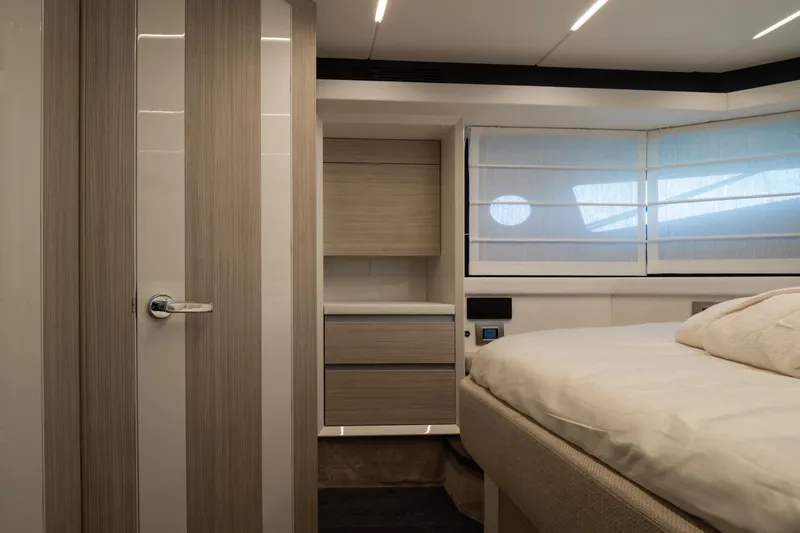 Curly Yacht Photos Pics Luxurious interior of 2021 Cranchi E52S yacht with modern bedroom design.