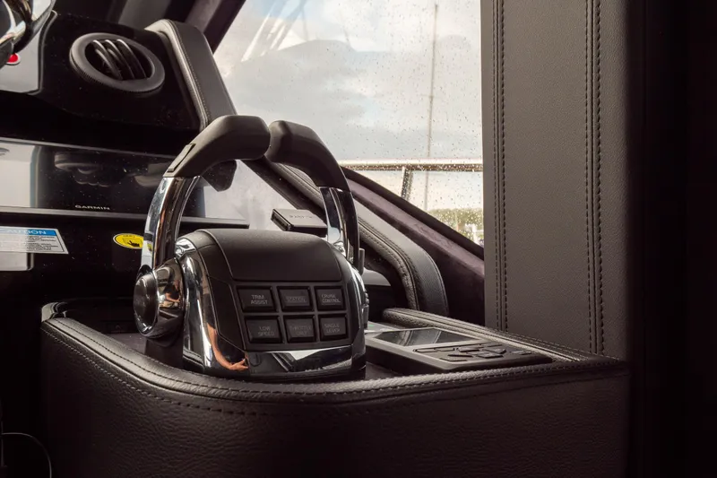 Curly Yacht Photos Pics Control panel of 2021 Cranchi E52S yacht, featuring sleek design and advanced navigation controls.