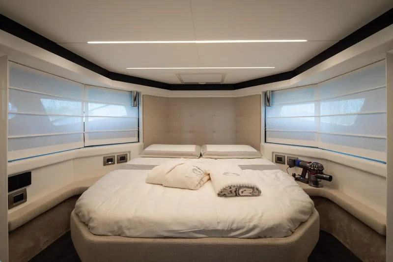 Curly Yacht Photos Pics Luxurious interior of 2021 Cranchi E52S yacht with modern bedroom design.
