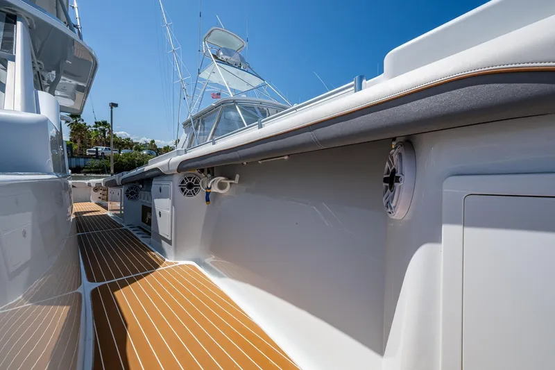  Yacht Photos Pics 2022 Yellowfin 54 Offshore boat deck with sleek design and modern features.
