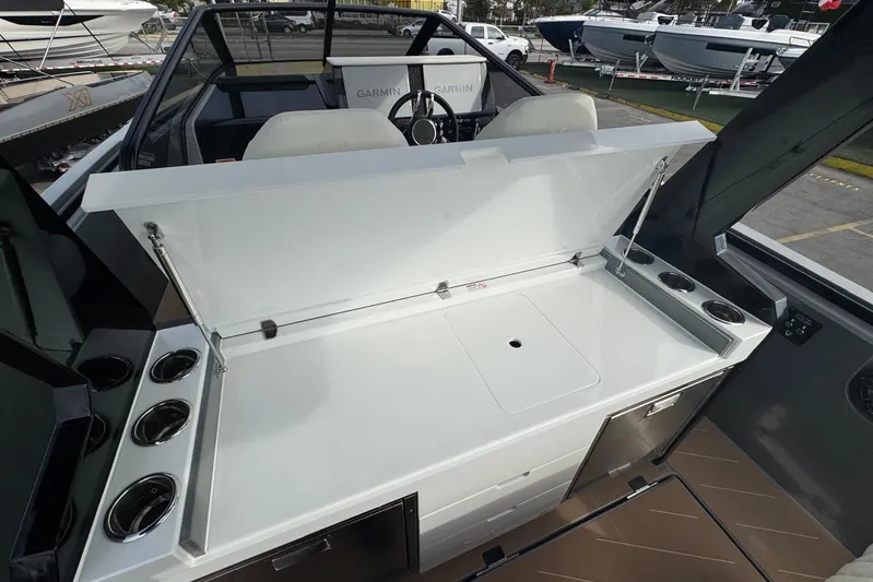 Virtue Yacht Photos Pics Open deck area of 2026 Virtue V10 boat with modern amenities and seating.