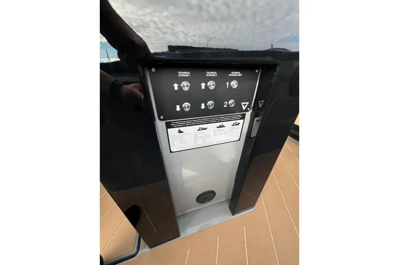 Virtue Yacht Photos Pics Control panel of 2026 Virtue V10 with technical storage buttons and instructions.