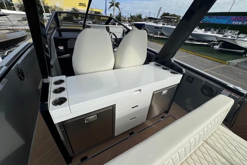 Virtue Yacht Photos Pics Interior of 2026 Virtue V10 boat with modern seating and storage compartments.