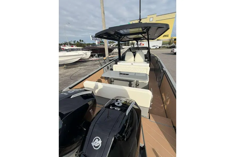 Virtue Yacht Photos Pics 2026 Virtue V10 boat with dual engines, spacious deck, and modern seating.