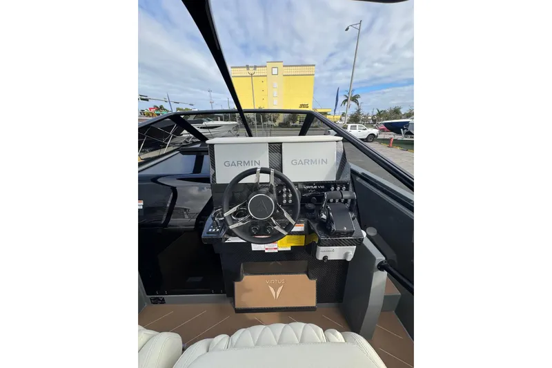 Virtue Yacht Photos Pics Steering console of 2026 Virtue V10 boat with Garmin navigation systems.