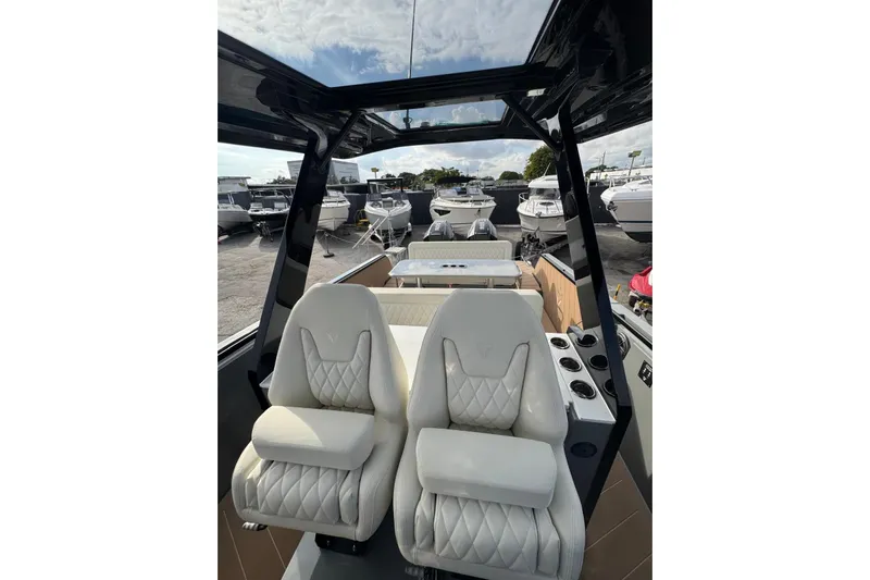 Virtue Yacht Photos Pics Luxury interior of 2026 Virtue V10 boat with plush seating and modern design.