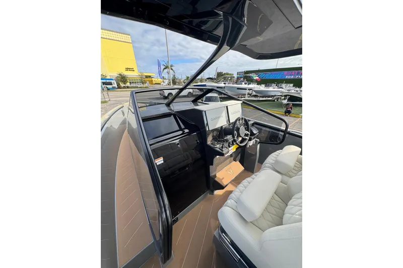 Virtue Yacht Photos Pics Interior of 2026 Virtue V10 boat with Garmin navigation and luxurious seating.