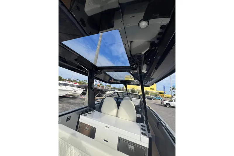 Virtue Yacht Photos Pics Interior view of 2026 Virtue V10 boat with modern seating and sleek design.