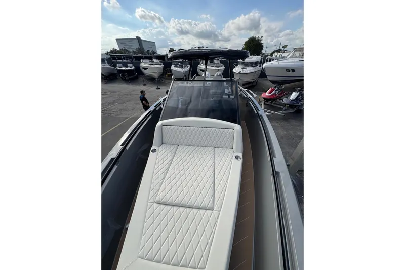 Virtue Yacht Photos Pics Luxury 2026 Virtue V10 boat with sleek design and spacious deck.