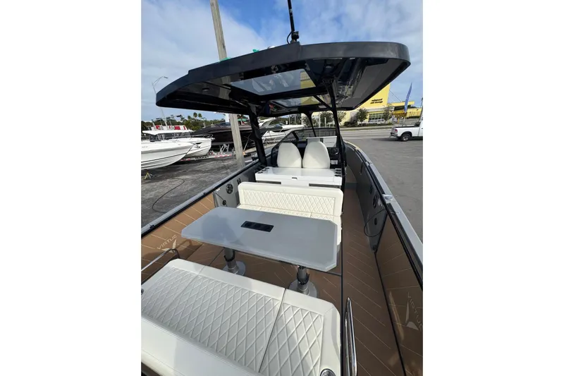Virtue Yacht Photos Pics 2026 Virtue V10 boat interior with sleek seating and modern design.