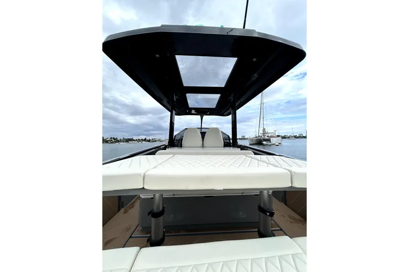 Virtue Yacht Photos Pics Luxury 2026 Virtue V10 yacht with sleek design and spacious seating on open water.