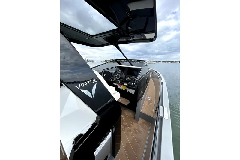 Virtue Yacht Photos Pics 2026 Virtue V10 luxury boat interior with sleek design and advanced navigation system.