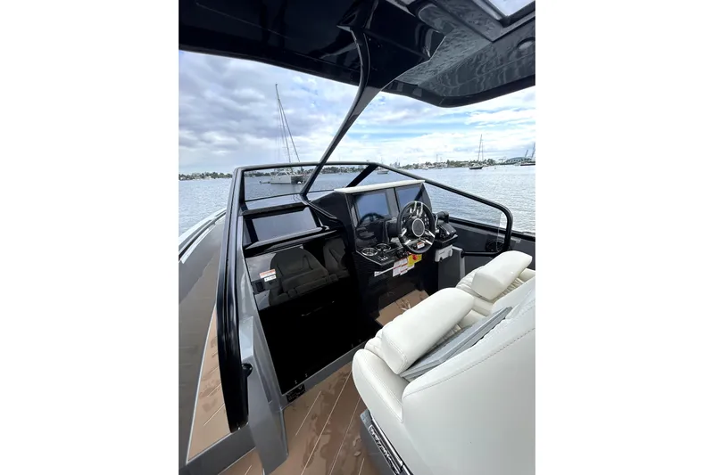 Virtue Yacht Photos Pics Interior of 2026 Virtue V10 boat with modern steering and navigation system.