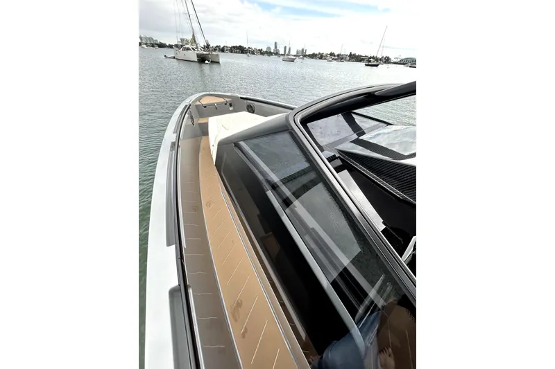 Virtue Yacht Photos Pics 2026 Virtue V10 luxury yacht on calm waters, showcasing sleek design and modern features.