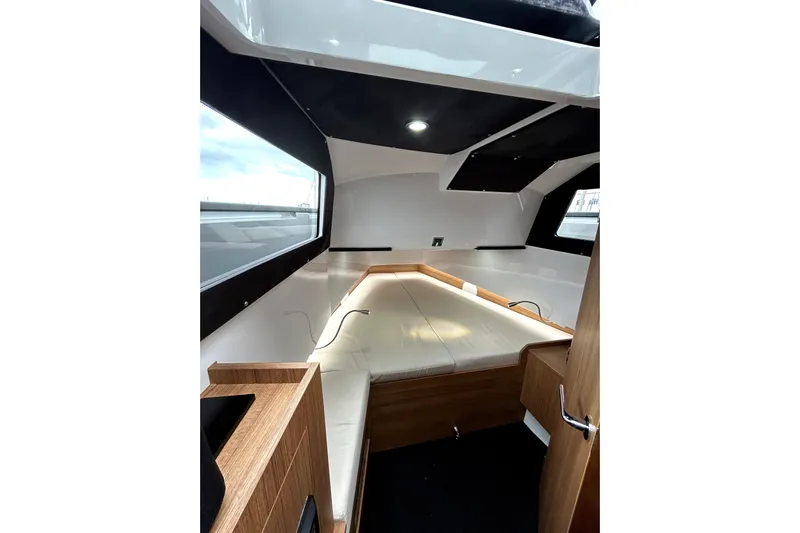 Virtue Yacht Photos Pics Interior of 2026 Virtue V10 boat, featuring sleek design and comfortable seating.