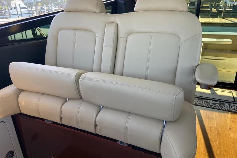 Godsend Yacht Photos Pics Luxurious beige leather seating on 2015 Sea Ray 470 Sundancer yacht, showcasing comfort and elegance.