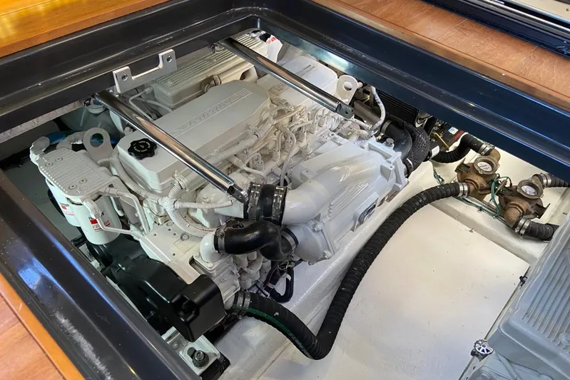 Godsend Yacht Photos Pics Engine compartment of a 2015 Sea Ray 470 Sundancer yacht, showcasing mechanical components.