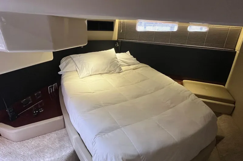 Godsend Yacht Photos Pics Luxurious bedroom interior of 2015 Sea Ray 470 Sundancer yacht.