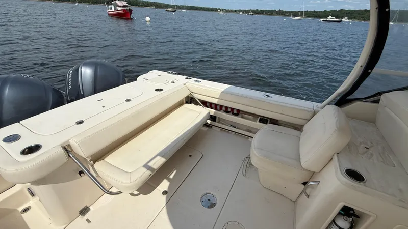 Aletha P Llc Yacht Photos Pics 2016 Grady-White Freedom 307 boat interior with seating and twin Yamaha engines.