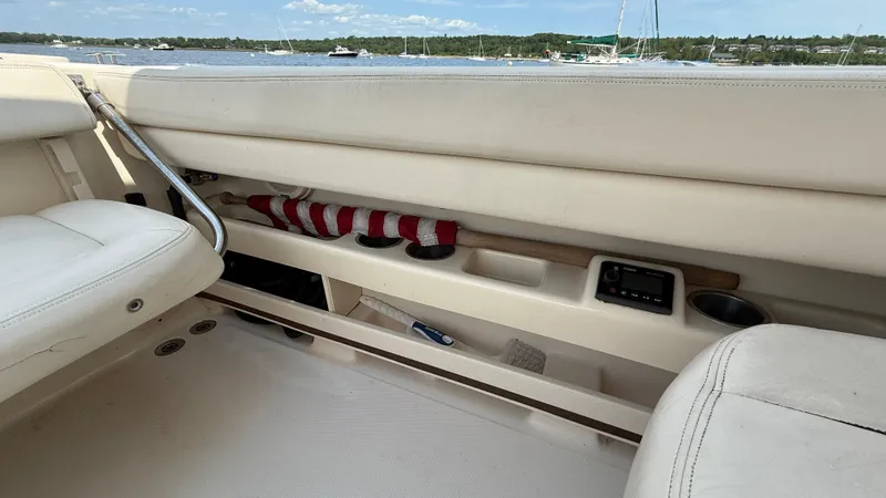 Aletha P Llc Yacht Photos Pics Interior of 2016 Grady-White Freedom 307 boat with seating and storage compartments.