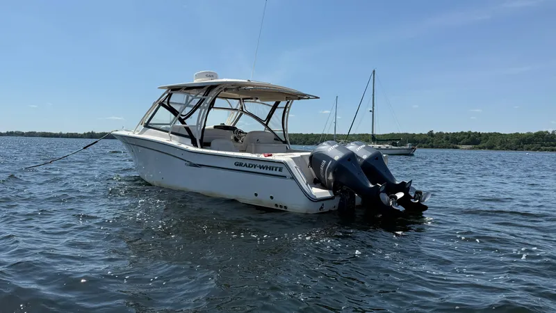 Aletha P Llc Yacht Photos Pics 2016 Grady-White Freedom 307 boat on water, clear sky, dual engines.