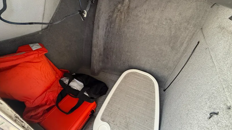 Aletha P Llc Yacht Photos Pics Interior storage of 2016 Grady-White Freedom 307 boat with safety gear and equipment.