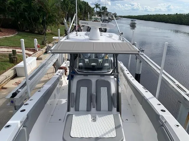  Yacht Photos Pics 2017 Sea Fox 328 Commander boat docked on a scenic river.