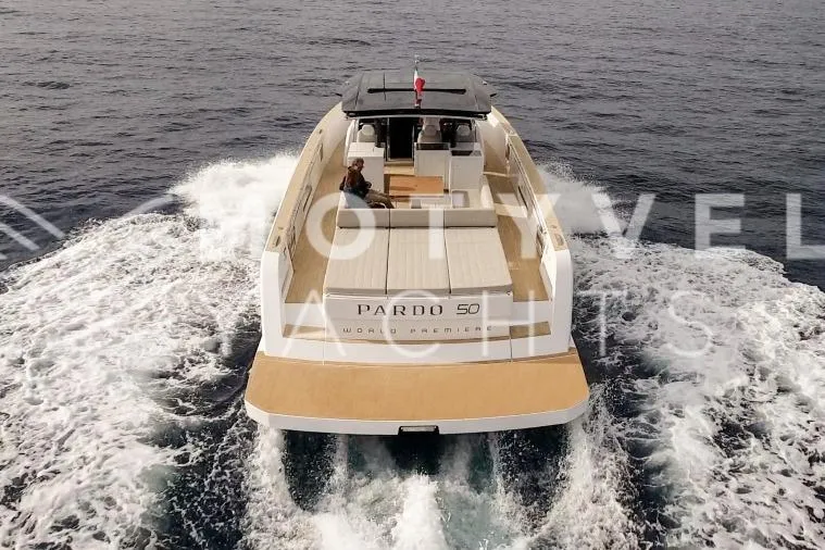  Yacht Photos Pics 2023 Pardo Yachts 50 cruising on open water, rear view.