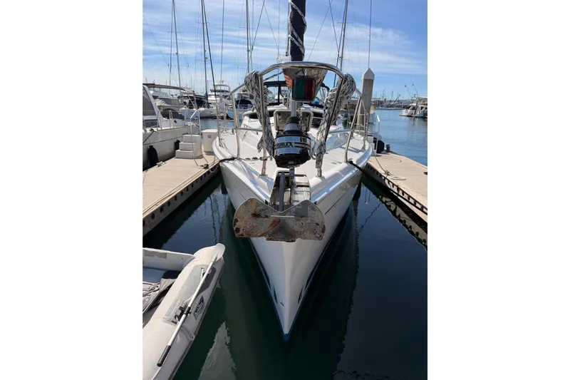 Wailele Yacht Photos Pics 2007 Hunter 44 Deck Salon yacht docked at marina, front view.