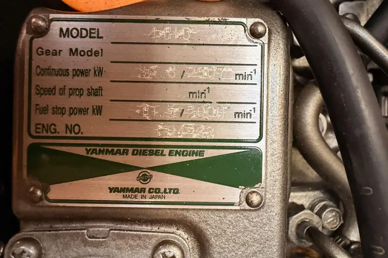 Wailele Yacht Photos Pics Yanmar diesel engine plate on 2007 Hunter 44 Deck Salon sailboat.