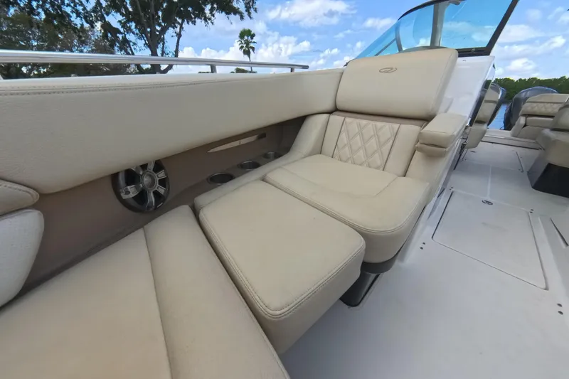  Yacht Photos Pics 2018 Regal 29 OBX boat interior with beige seating and cup holders.