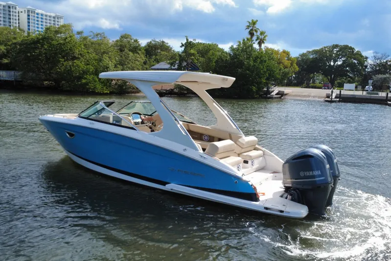  Yacht Photos Pics 2018 Regal 29 OBX boat with Yamaha engine on a scenic waterway.