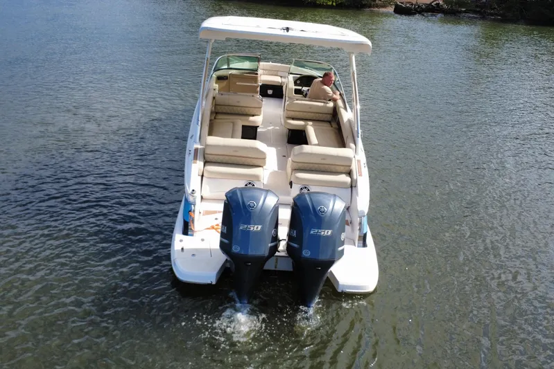  Yacht Photos Pics 2018 Regal 29 OBX boat with dual Yamaha 250 engines on calm water.