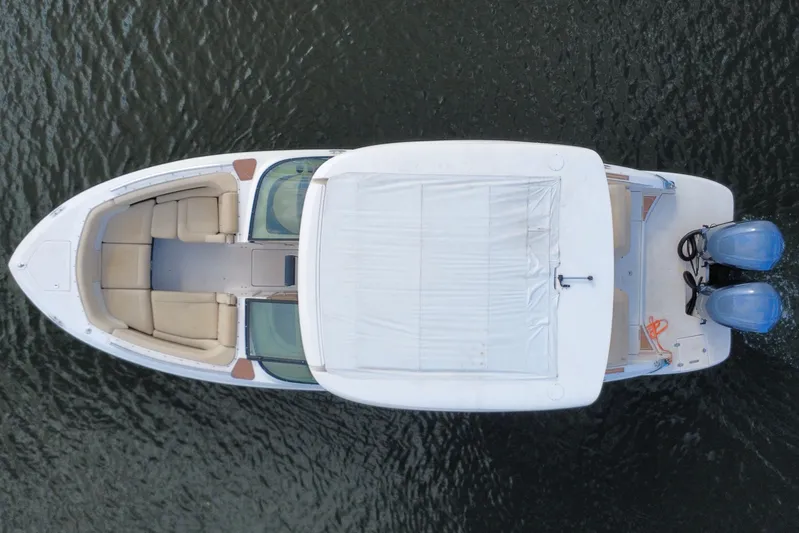  Yacht Photos Pics Top view of 2018 Regal 29 OBX boat with dual engines on water.