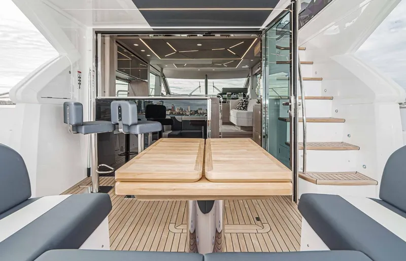  Yacht Photos Pics Luxurious 2024 Sunseeker Manhattan 55 yacht interior with elegant seating and modern design.