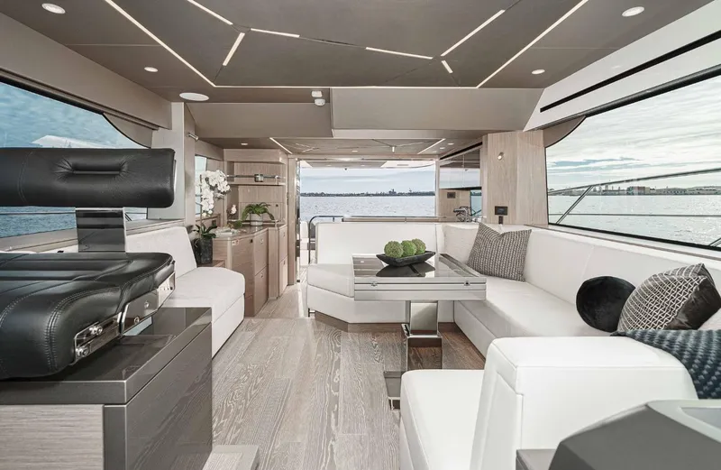  Yacht Photos Pics Luxurious interior of 2024 Sunseeker Manhattan 55 yacht with modern furnishings and sea view.