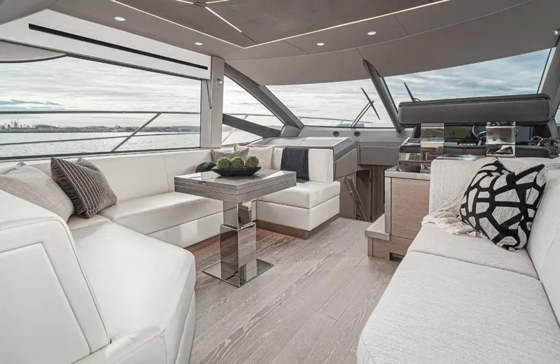  Yacht Photos Pics Luxurious interior of 2024 Sunseeker Manhattan 55 yacht with elegant seating and modern design.
