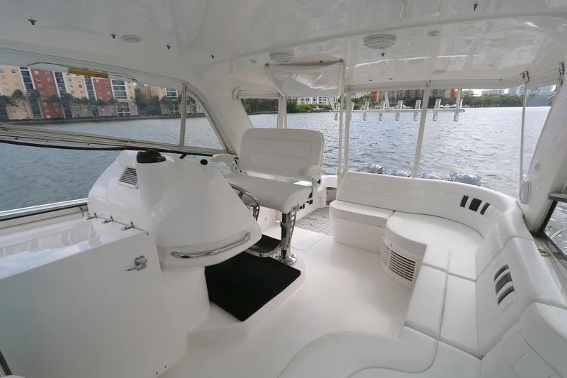  Yacht Photos Pics Luxurious interior of 2012 Intrepid 475 Sport Yacht with waterfront view.